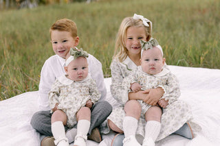 The Twin Hand-Smocked One-Piece